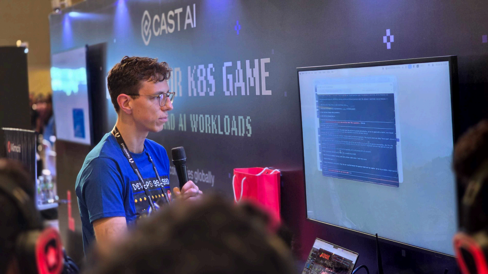 Kimchi at the Cast AI booth — live demo on the show floor
